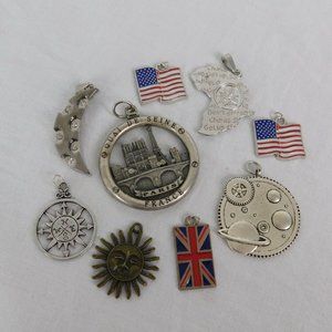Lot of 9 Travel Sun Moon Planet Themed Pendants US & British Flag Compass Paris